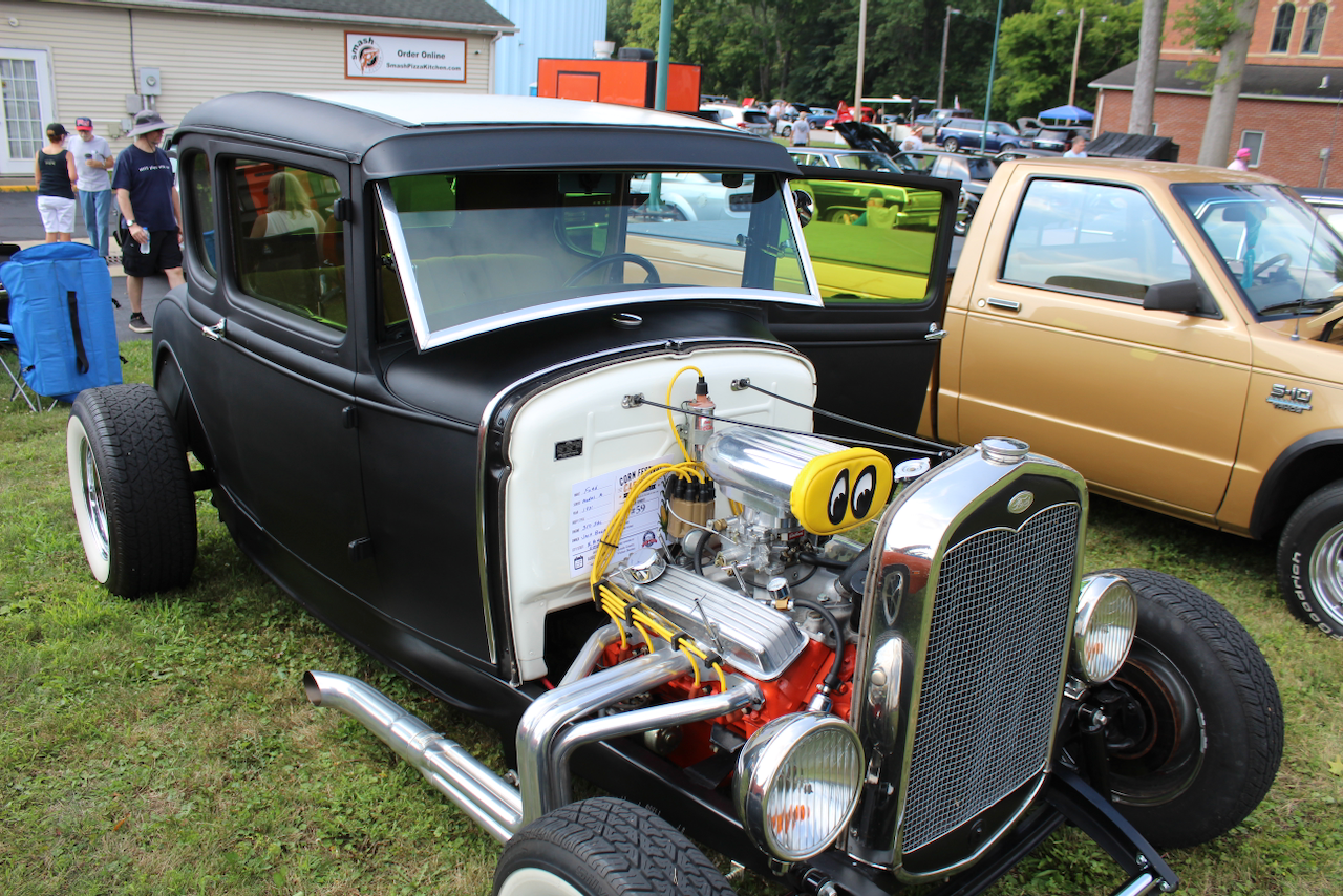 1930s Ford-style hot rod coupe engine bay, detail view