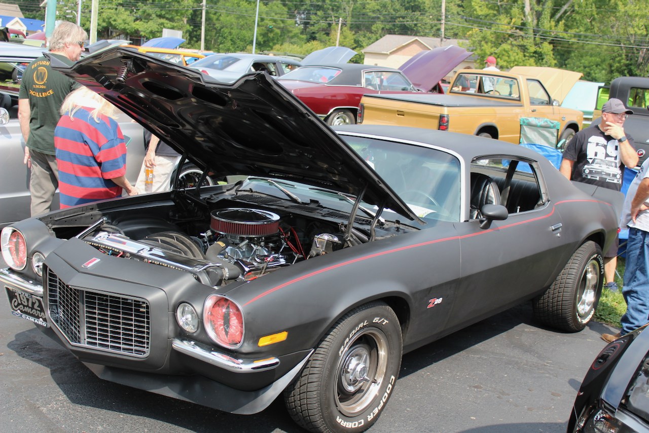 1972 Chevrolet Camaro Z28, matte black, hood open front three-quarter view